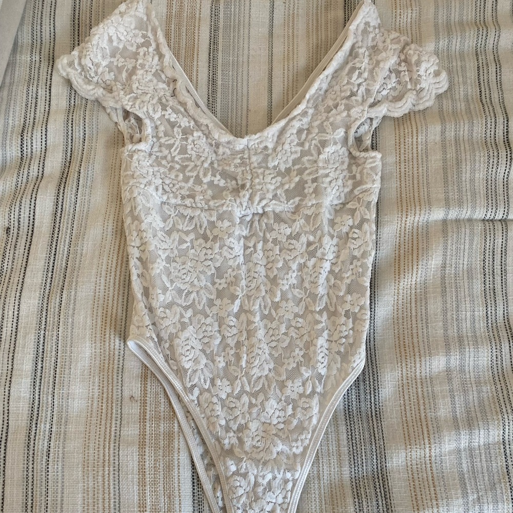 Elegant White Lace Bodysuit